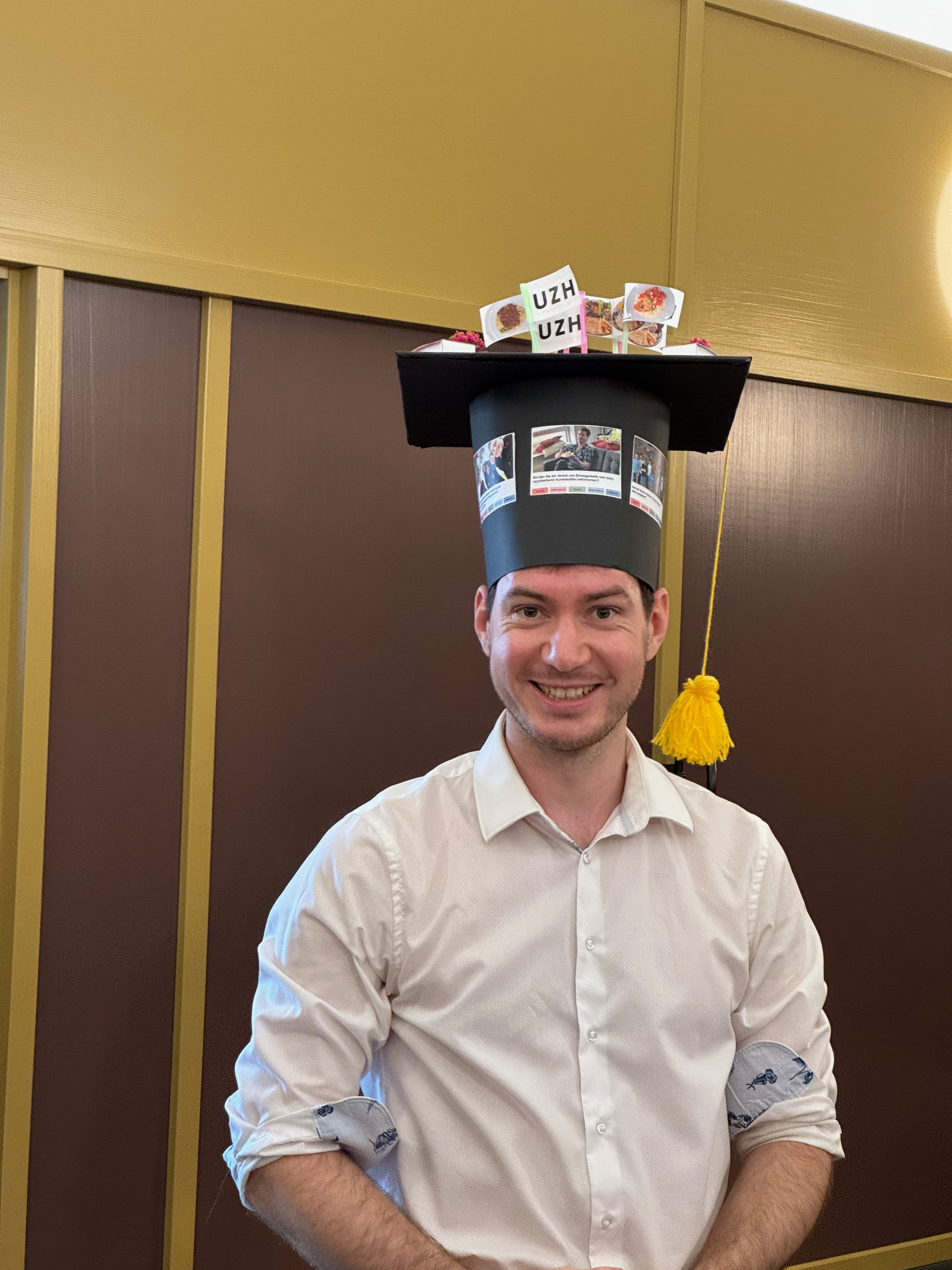 Fynn Bachmann wearing his Doctoral Hat