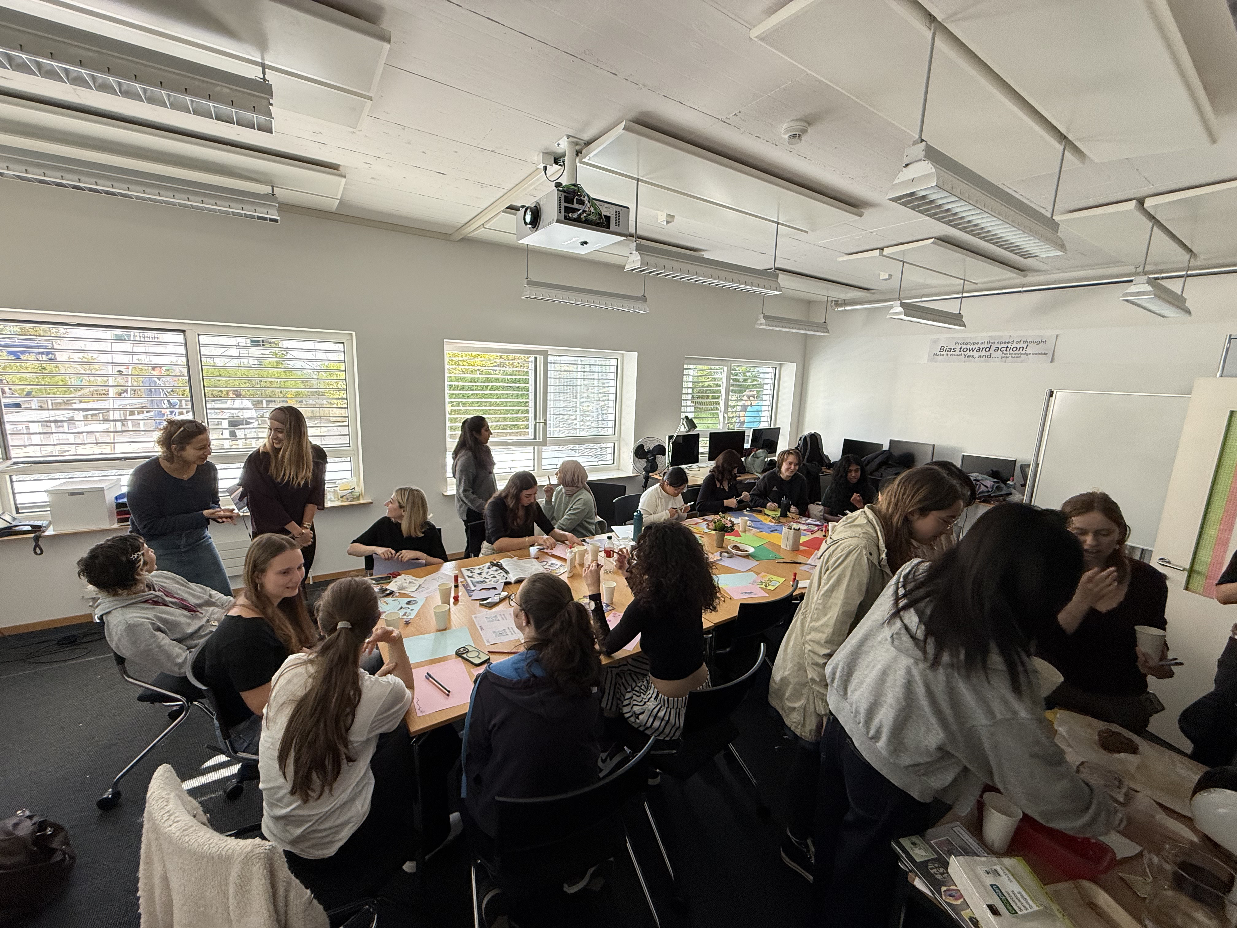 Students creating zine collages